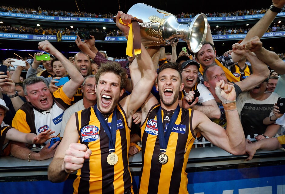 AFL 2014 Toyota Grand Final - Sydney v Hawthorn Grant Birchall and Jack Gunston of the Hawks with fans after the 2014 Toyota AFL Grand Final match between the Sydney Swans and the Hawthorn Hawks at the MCG, Melbourne on September 27, 2014. (Photo: David Callow/AFL Media)